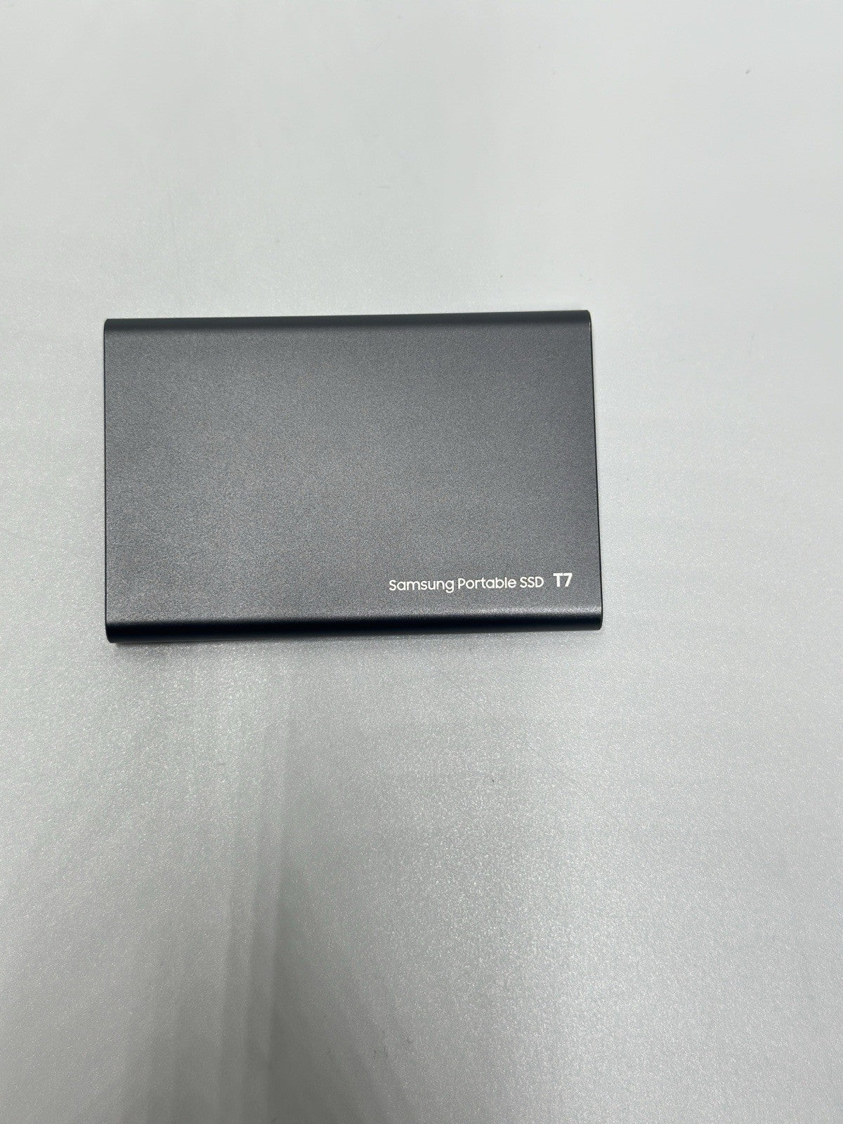 Samsung T7 1TB Portable External SSD - Grade A- Titan Grey (MU-PC1T0T/WW)